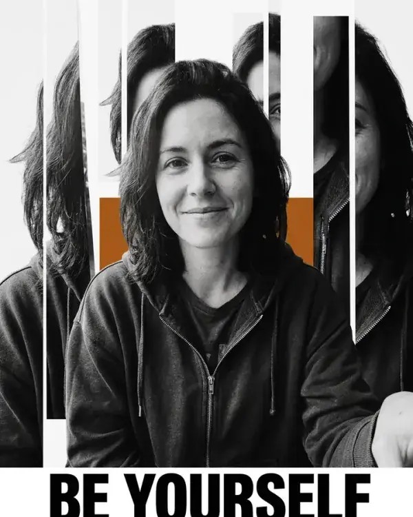 A black-and-white manifesto poster of a woman with the headline BE YOURSELF