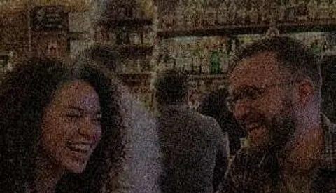 Close-up of the two friends in the dark, noisy photo